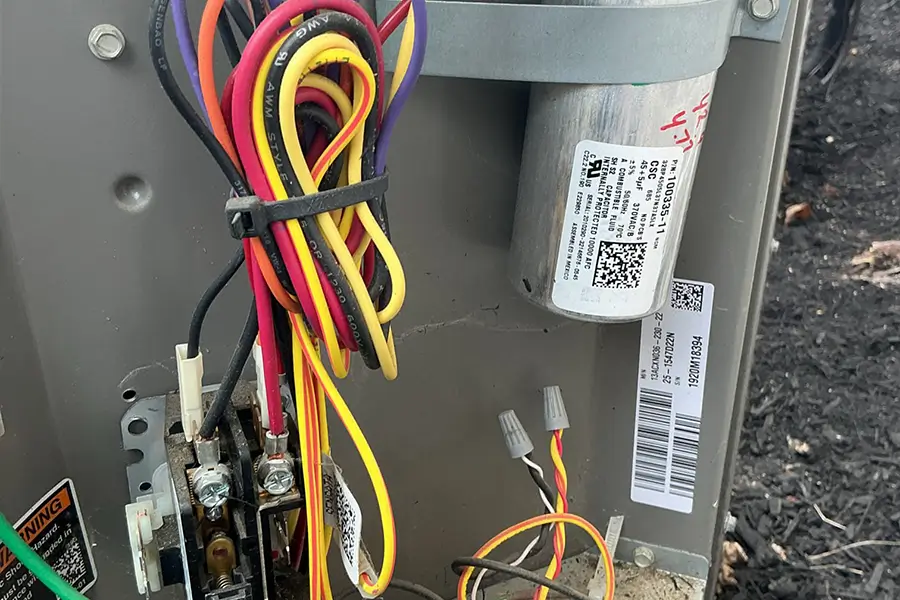 AC capacitor replacement in progress