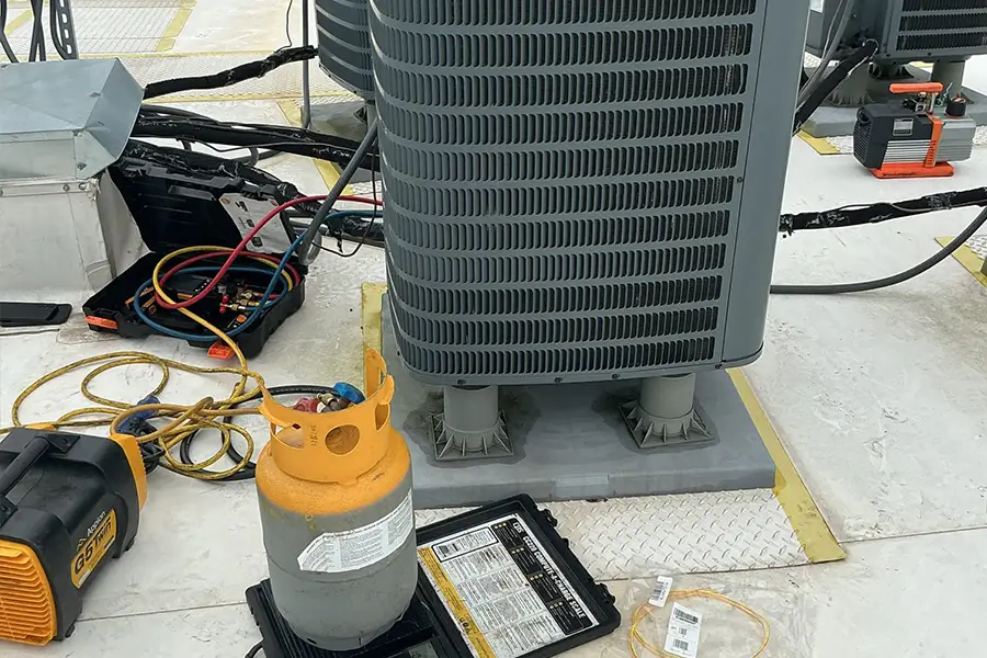 AC compressor repair in progress