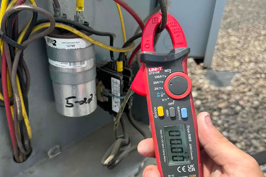 Technician performing AC repair
