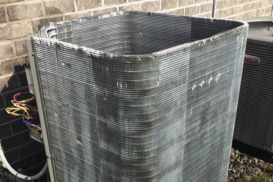 AC coil cleaning in progress