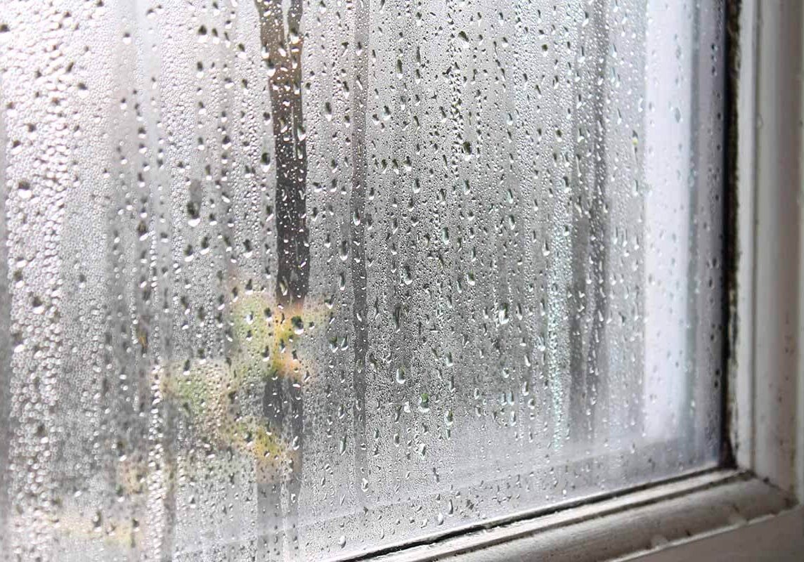 condensation from humidity on a window in a house